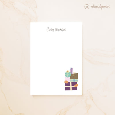 notepad with colorful gift boxes