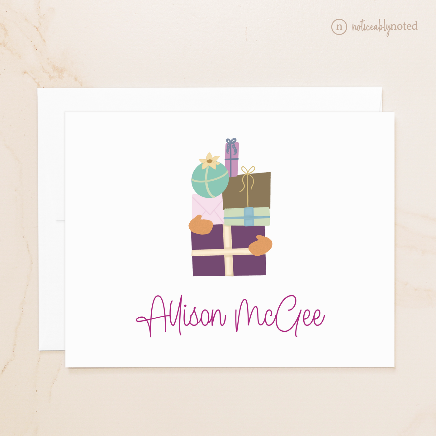 folded note card with colorful gift boxes