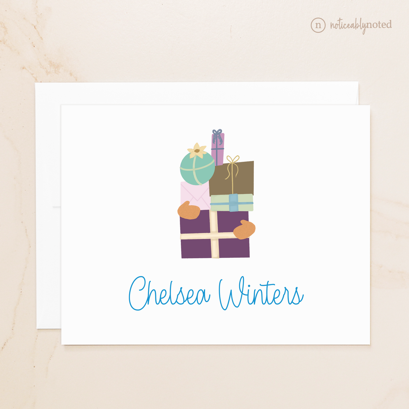 folded note card with colorful gift boxes