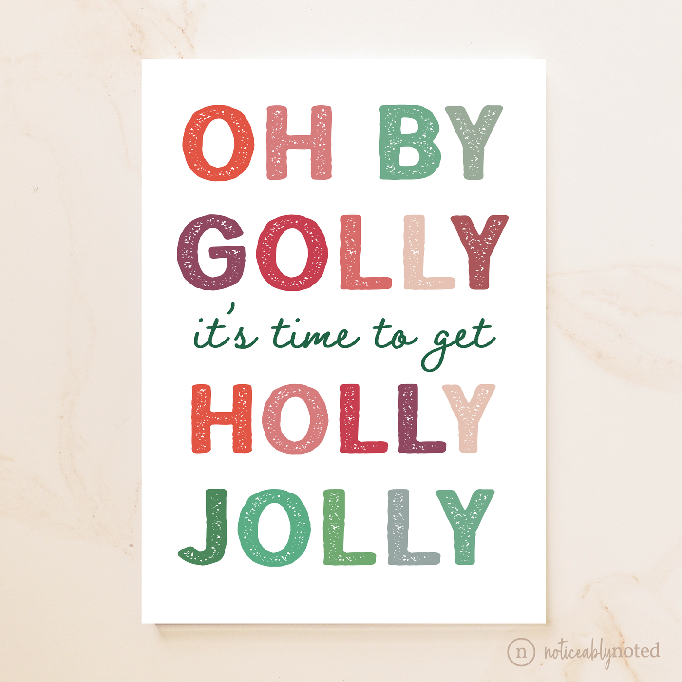 Christmas-themed card with colorful text on a beige background