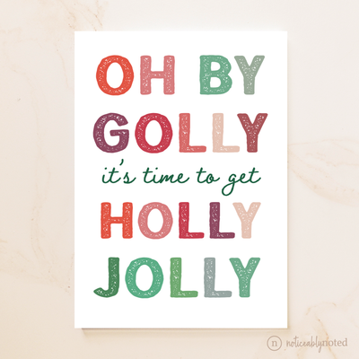 Christmas-themed card with colorful text on a beige background