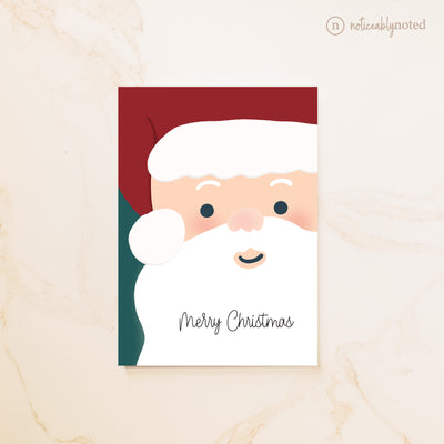 Card with illustration of Santa Claus with 'Merry Christmas' text on a beige background